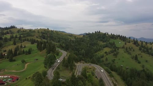 Spectacular Road With Cars Over The Hills