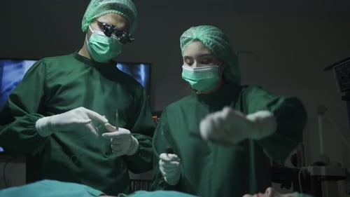 Medical Surgeons Team Performing Surgical Operation in Modern Operating medical Room at hospital.