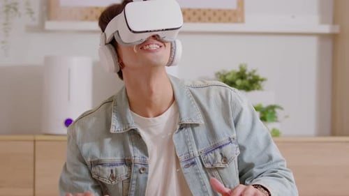 Man Using Virtual Reality Headset Indoors