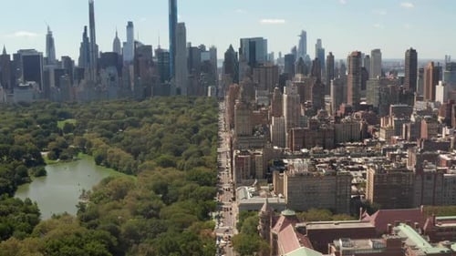 Flight Over Beautiful New York City Street at Central Park on Sunny Summer Day