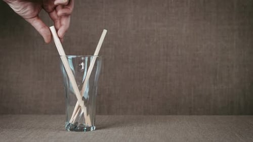Removing Wooden Sticks From Glass in a Studio