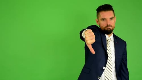 Business Man Shows Thumb on Disagreement, Green Screen, Studio
