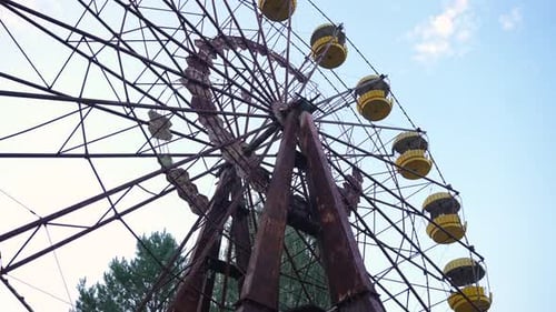 Abandoned Rusted Ferris Wheel Under Sky