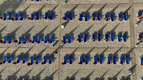 Empty sun loungers on the beach aerial view 4 K Turkey Alanya