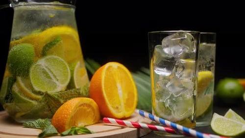 Refreshing Citrus Drink with Limes and Oranges