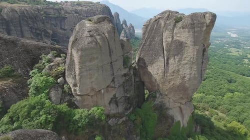 Flying over Meteora rock formations and monasteries in Greece