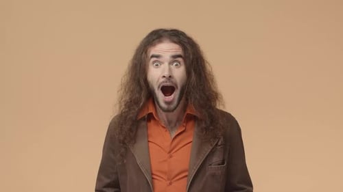 Man Reacting with Surprise and Excitement