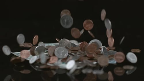 Coins falling in slow motion; shot on Phantom Flex 4K at 1000 fps