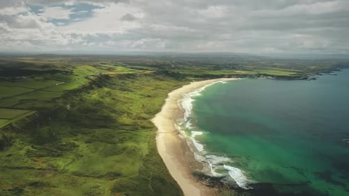 White Beach Sand Coast Aerial Zooming, Antrim County, Nortern Ireland. Epic Irish Landscape