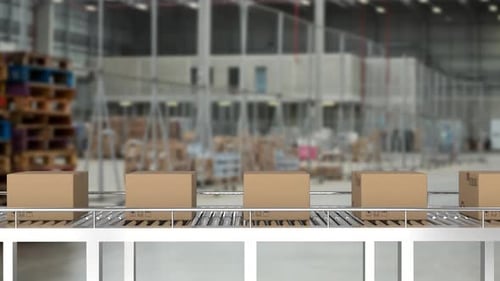Boxes Transported on Conveyor Belt in Modern Warehouse