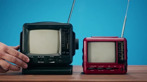 Two Vintage Miniature Televisions with Static Display
