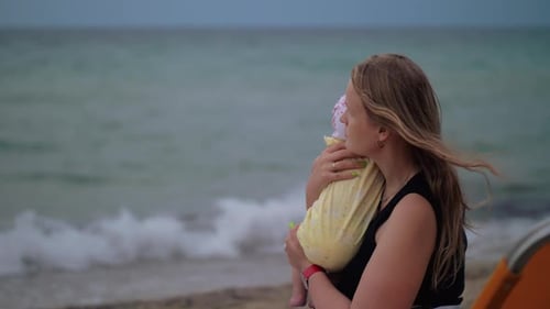 - Mum with Baby Looking the Sea