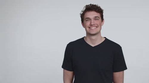 Young Man Smilling at the Camera