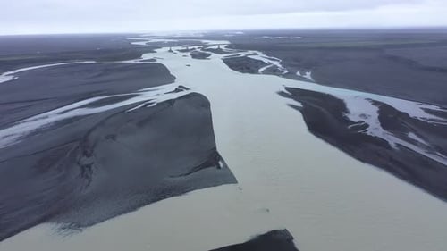 Flying Over a Glacial River System in Iceland, Aerial View