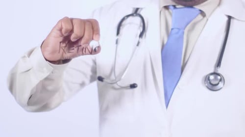 Doctor Writes Retinol on Clear Surface