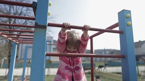 Funny Cute Girl Is Playing. Joyous Female Child Having Fun on Playground