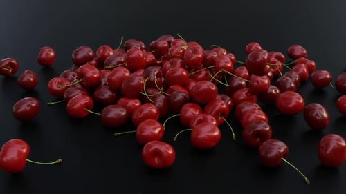 Realistic Red Cherries Falling onto Black Surface