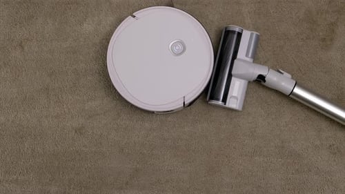 Robot Vacuum with Cordless Stick Vacuum on Carpet