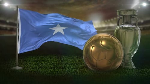 National Flag of Somalia Waving with Football and Trophy on Sports Field