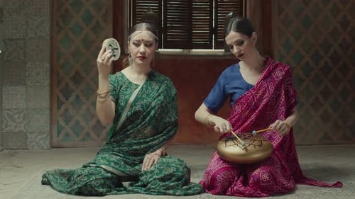 Women Playing Traditional Musical Instruments Indoors