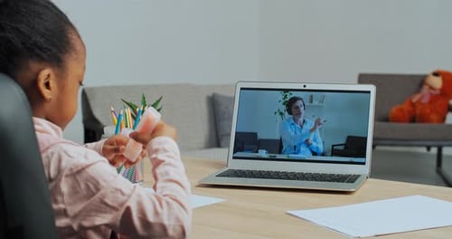 Child Studies Art Online with Remote Instructor