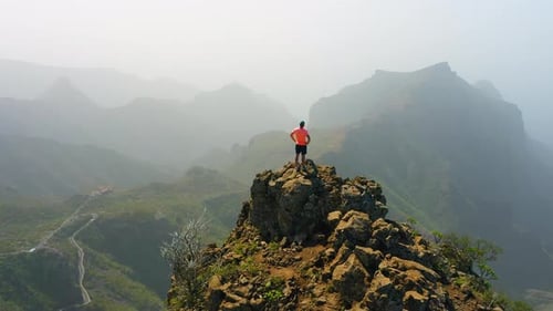 Tourist Man Enjoys Spectacular View Mountain Top