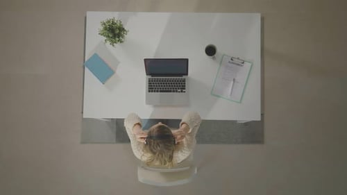 Woman working on home office