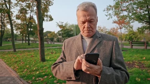 Mature Male Chatting Online in Park