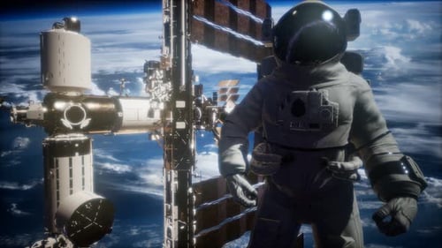 International Space Station and Astronaut in Outer Space Over the Planet Earth