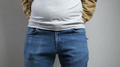 Man Pulls Cash from Pocket