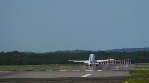 Airplane Taking Off from Airport Runway During Daytime