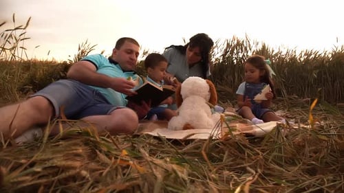 Picnic on Nature of Caucasian Family with Two Children in Slowmo