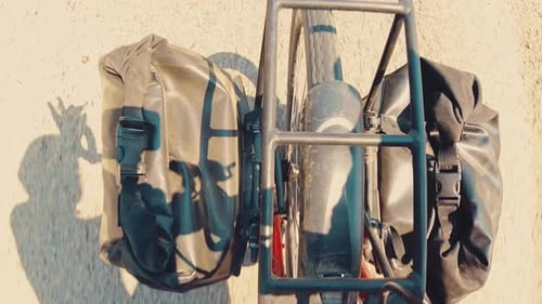 Rolling Bike Wheel with Panniers, Travel Concept