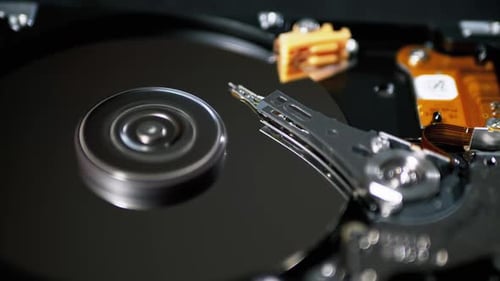 Hard Disk Drive Inside. Structure of HDD, Spinning Platter. Move Magnetic Head