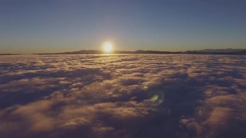 Above the Clouds At Sunrise