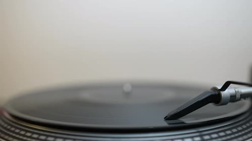 Vinyl Record Spinning on a Turntable Close Up