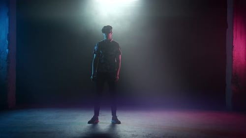 Young Adult Playing in Virtual Reality with Headset