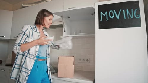 Happy Female in New Apartment