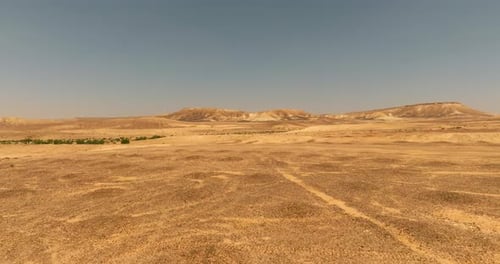 Dry Desert landscape, low pass aerial view.