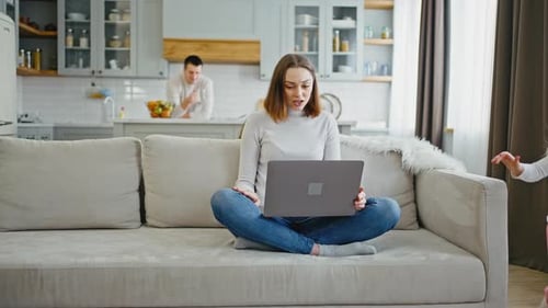 Irritated Woman Trying to Work at Home Her Children Disturbing Her