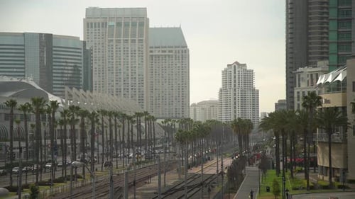 Pan left of railroad tracks near the Convention Center