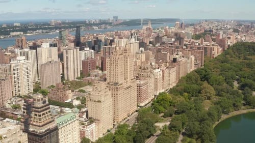 Beautiful New York City Buildings with Central Park at Sunny Summer Day