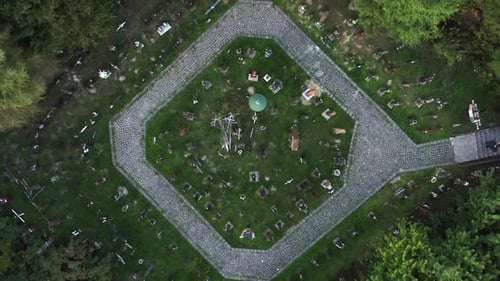 Ascending bird's eye view over battle memorial on Nyerges Teto, Romania