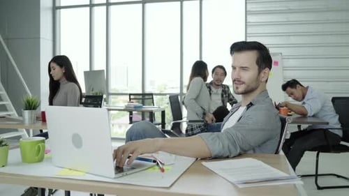 People Working Together in Modern Workplace