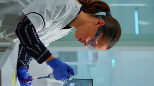 Scientist Working in a Modern Medical Lab