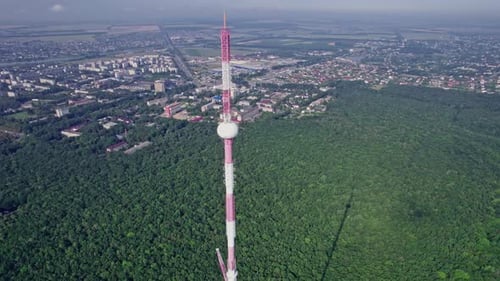 Fly Around Large Area of Large Telecommunications Tower