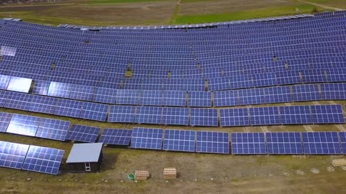 Solar Panels Farm (solar cell). Renewable green alternative energy concept - Aerial view