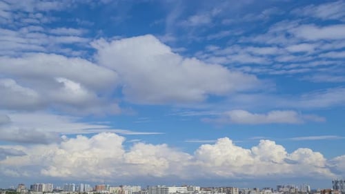 Sunny Summer City and Various Clouds