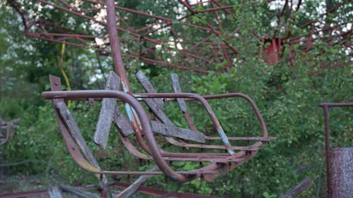 Abandoned, Rusted Ferris Wheel in Overgrown Amusement Park