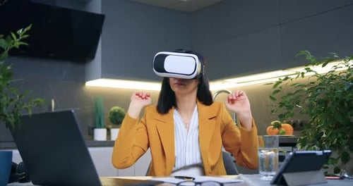 Woman Using VR Headset in Modern Kitchen